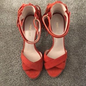Size 7.5 Nine West heel with fringe